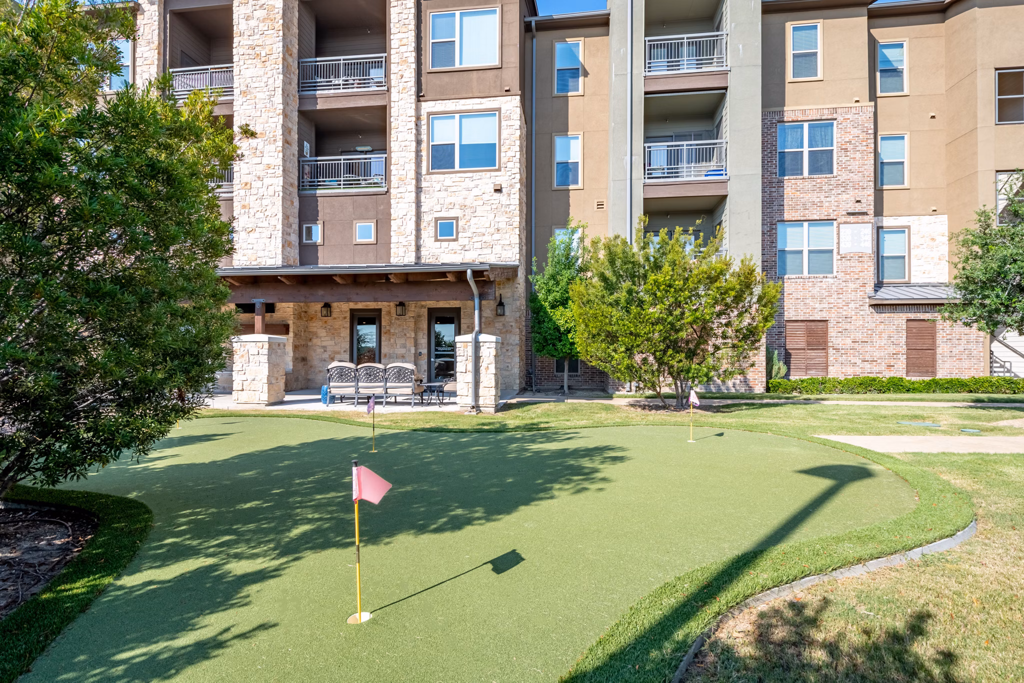Outdoor sport court at Larkspur at Twin Creeks Apartments offering recreational space for residents