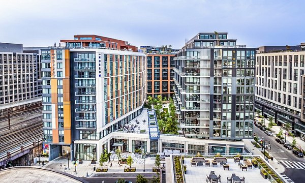 Market House Apartments: Elegant facade of luxury apartment building in prime urban location