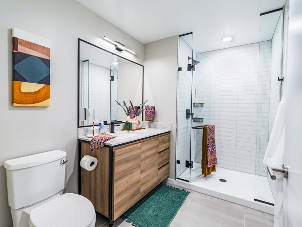Modern bathroom with elegant fixtures at Market House Apartments in Greystar community