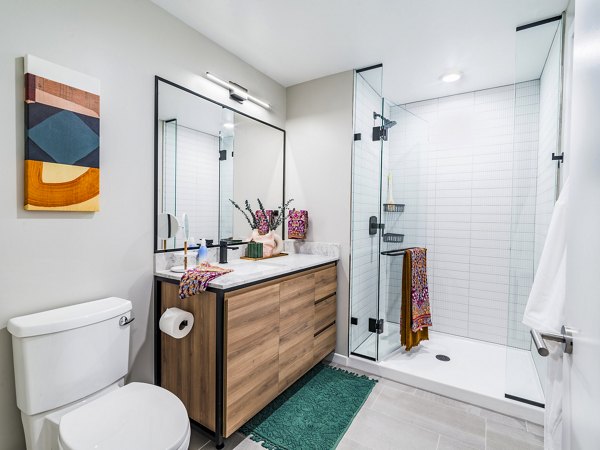 Modern bathroom with elegant fixtures at Market House Apartments in Greystar community