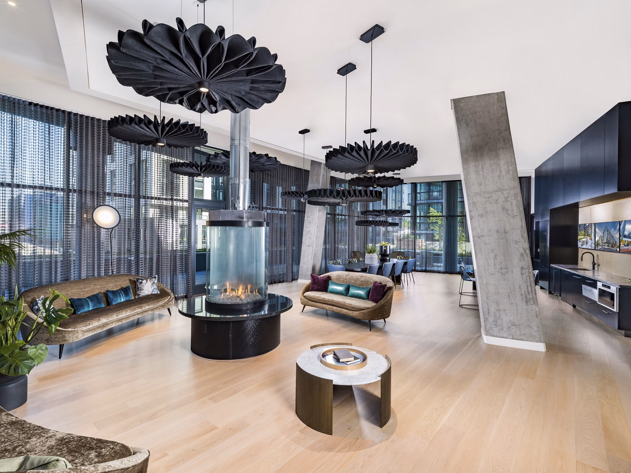 Clubhouse featuring modern design and comfortable seating at Market House Apartments, a luxury community by Greystar