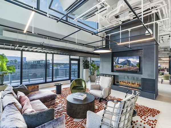 Modern clubhouse featuring a comfortable lounge area at Market House Apartments