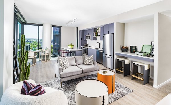 Cozy living room with modern furniture at Market House Apartments, offering luxury apartments in an upscale setting