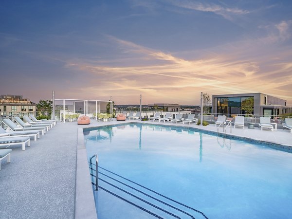 Luxury rooftop pool at Market House Apartments offering a serene retreat with city views Perfect community amenity for relaxation and leisure