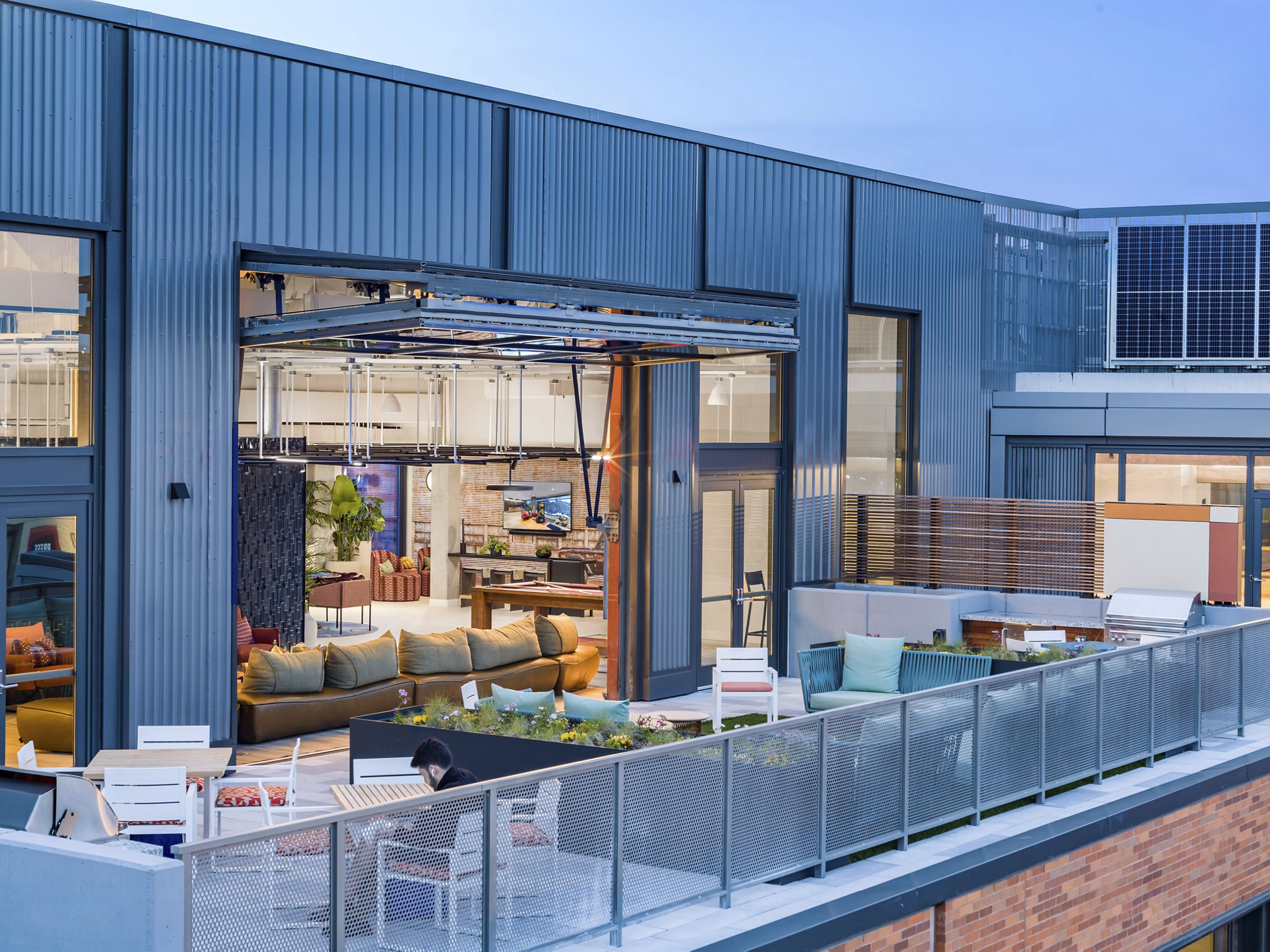 Inviting rooftop deck at Market House Apartments offering stunning skyline views