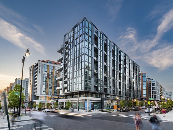 Rigby Apartments: Elegant view of luxury apartments in a vibrant urban setting