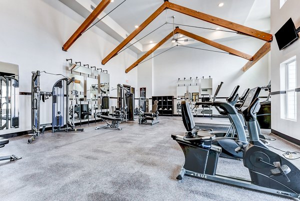 Modern fitness center with state-of-the-art equipment at Art House SATX Apartments for an active lifestyle