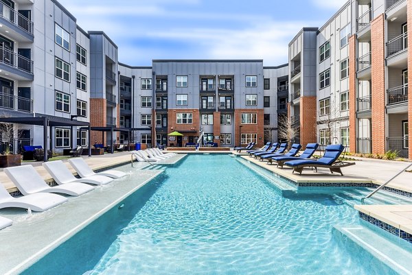 Rooftop pool with city views at Art House SATX Apartments