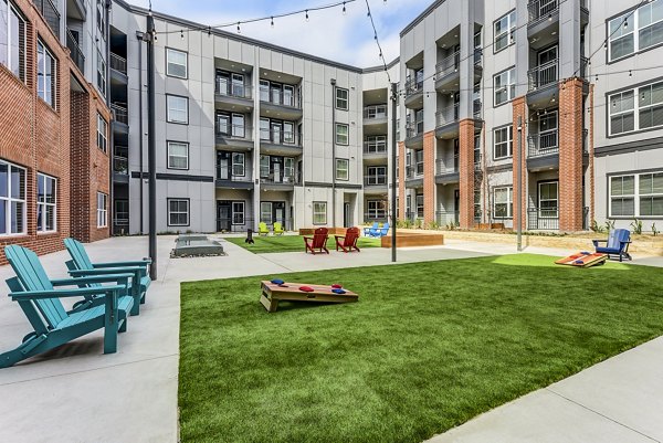 Recreational area with vibrant seating at Art House SATX Apartments