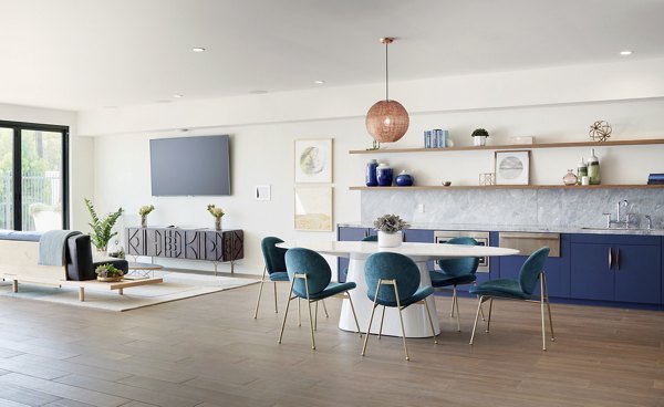 Modern clubhouse with cozy seating and community spaces at Eastway Apartments