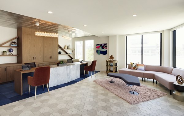 Modern clubhouse with lounge areas at Eastway Apartments, offering luxury amenities and a vibrant community atmosphere