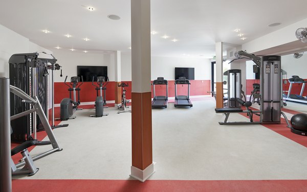 Modern fitness center with state-of-the-art equipment at Eastway Apartments