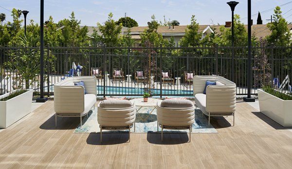 Relaxing courtyard with lush greenery at Eastway Apartments, a Greystar luxury community