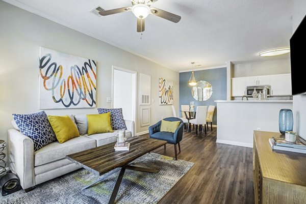 Contemporary living room with chic furnishings at Avant at Steele Creek luxury apartments