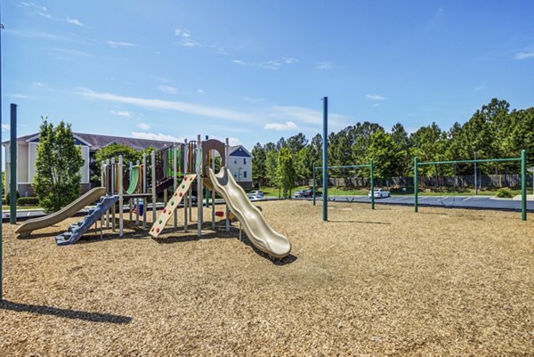 Outdoor recreational area with modern fitness equipment at Avant at Steele Creek luxury apartments