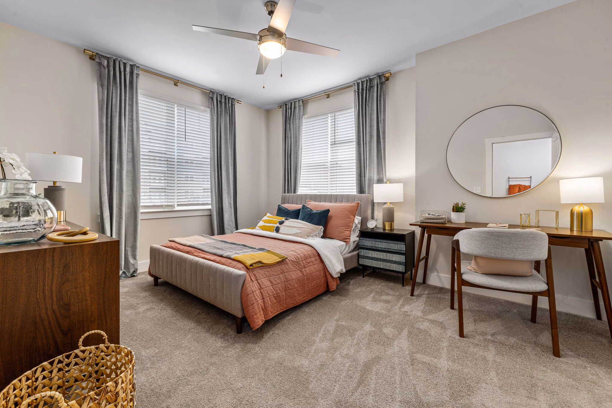 Contemporary bedroom with stylish decor at Encore at Heritage Apartments, offering luxury living and comfort