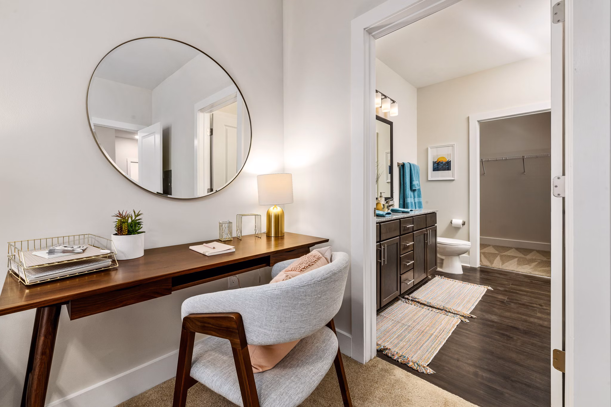 Bedroom with modern decor and large windows at Encore at Heritage Apartments