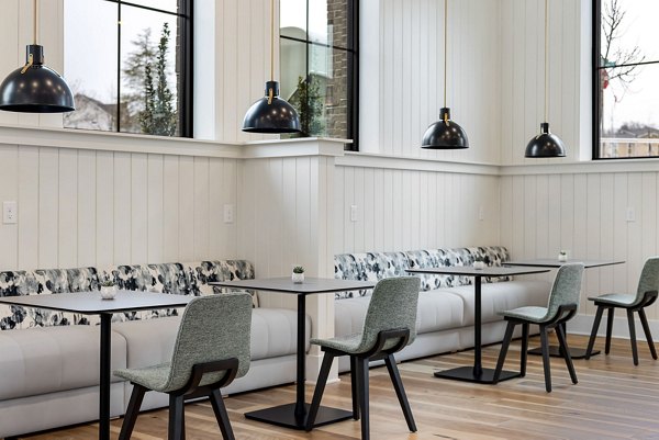Spacious clubhouse with modern design elements at Encore at Heritage Apartments