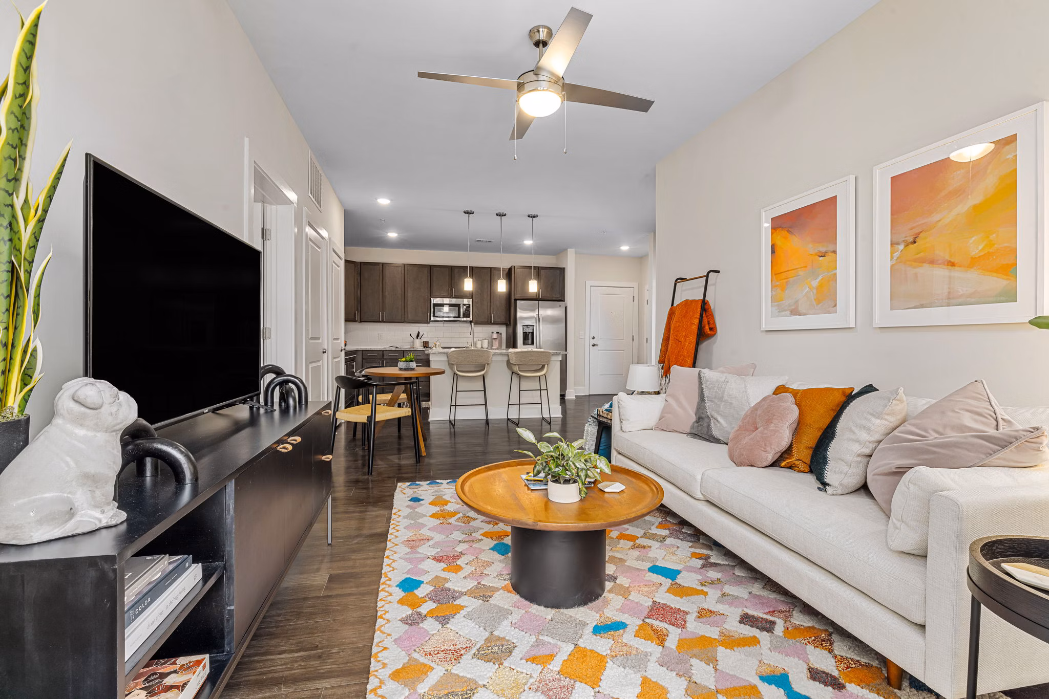 Elegant living room with modern furnishings at Encore at Heritage Apartments, a luxury community
