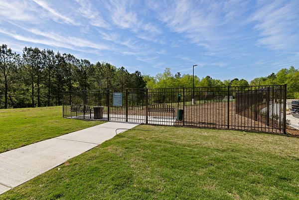 Dog park with agility equipment at Encore at Heritage Apartments, a Greystar community offering luxury pet-friendly amenities