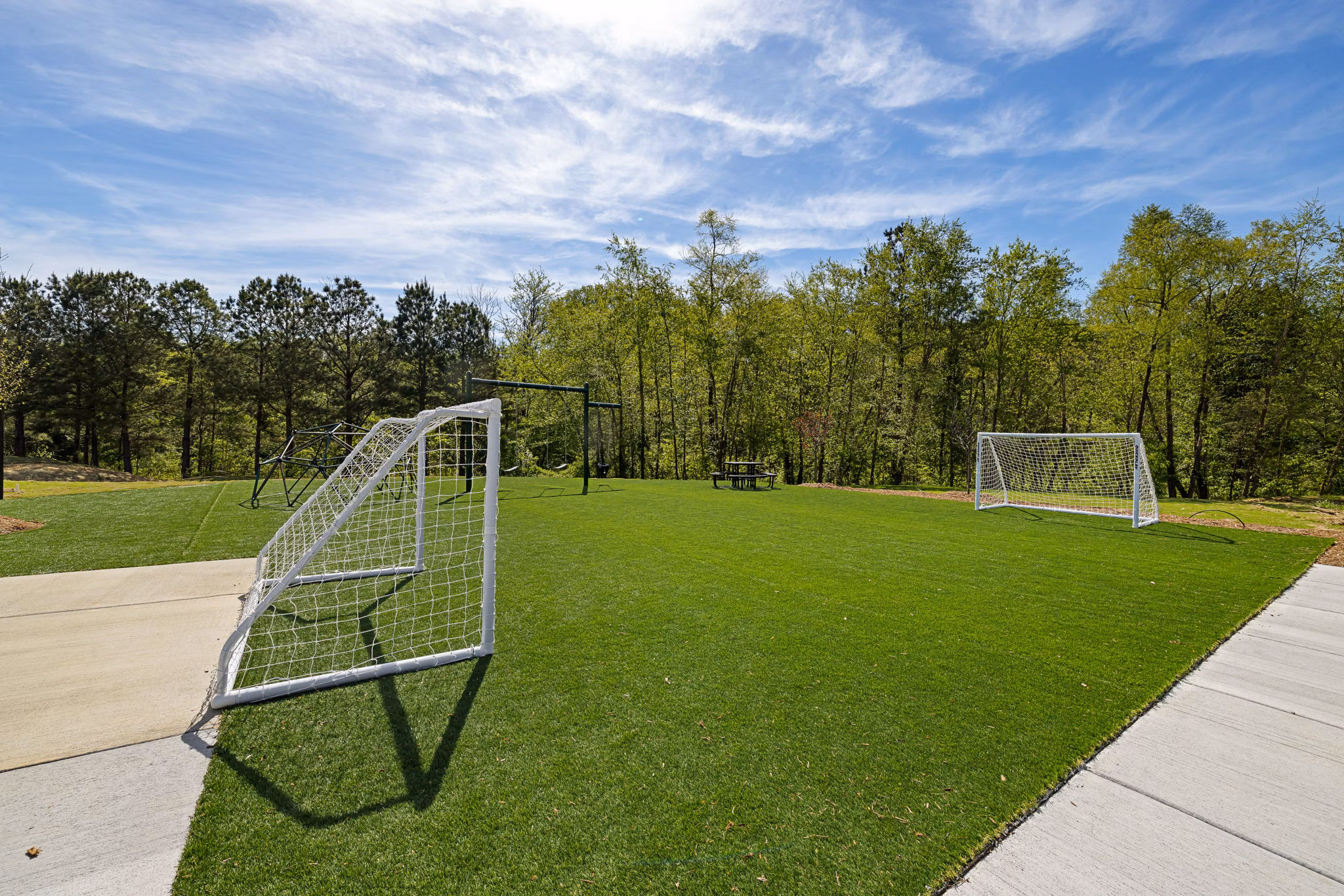 Sport court for basketball and tennis at Encore at Heritage Apartments
