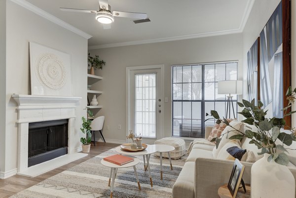 Sendero Ridge Apartments: Modern clubhouse featuring stylish seating and vibrant decor, offering luxury amenities in a premium living community
