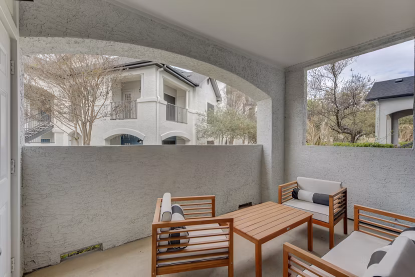 Clubhouse featuring modern design and cozy seating at Sendero Ridge Apartments