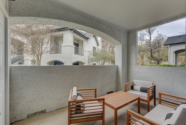 Clubhouse featuring modern design and cozy seating at Sendero Ridge Apartments
