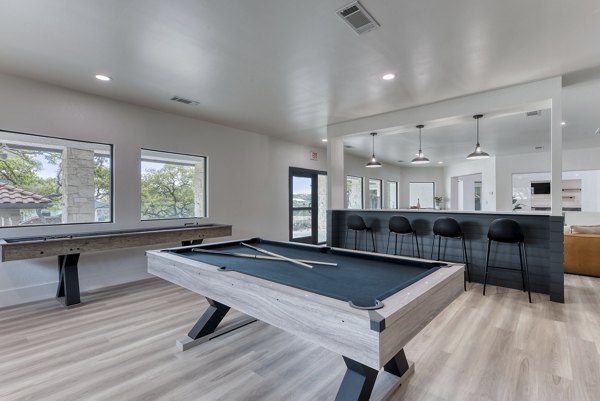 Clubhouse with modern seating and decor at Sendero Ridge Apartments, perfect for social gatherings and community events
