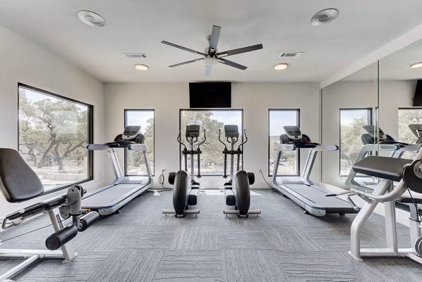 Modern fitness center with state-of-the-art equipment at Sendero Ridge Apartments