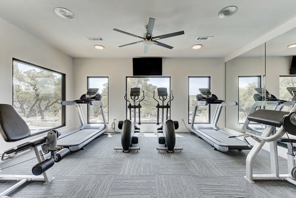 Modern fitness center with state-of-the-art equipment at Sendero Ridge Apartments