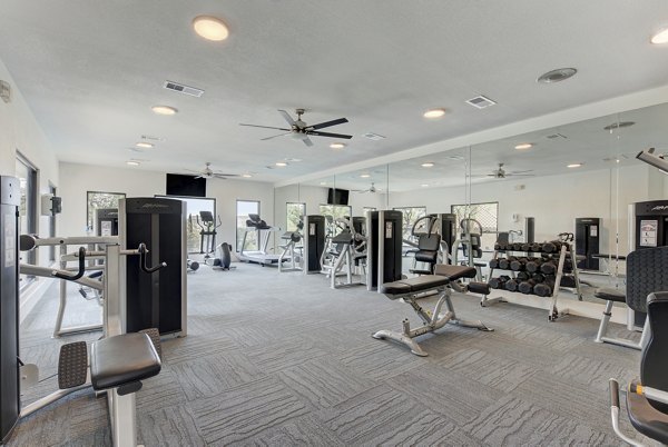 Modern fitness center equipped with state-of-the-art machines at Sendero Ridge Apartments
