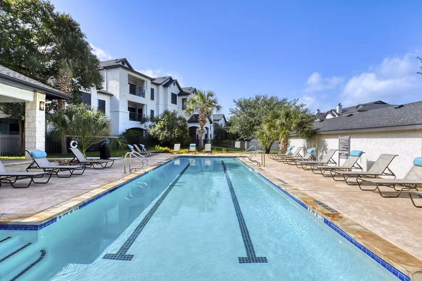 Rooftop pool with mountain views at Sendero Ridge Apartments