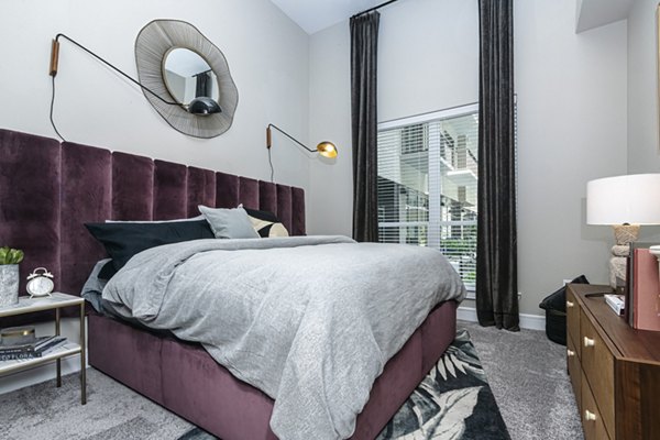 Modern bedroom with stylish furnishings in Canal 1535 Apartments