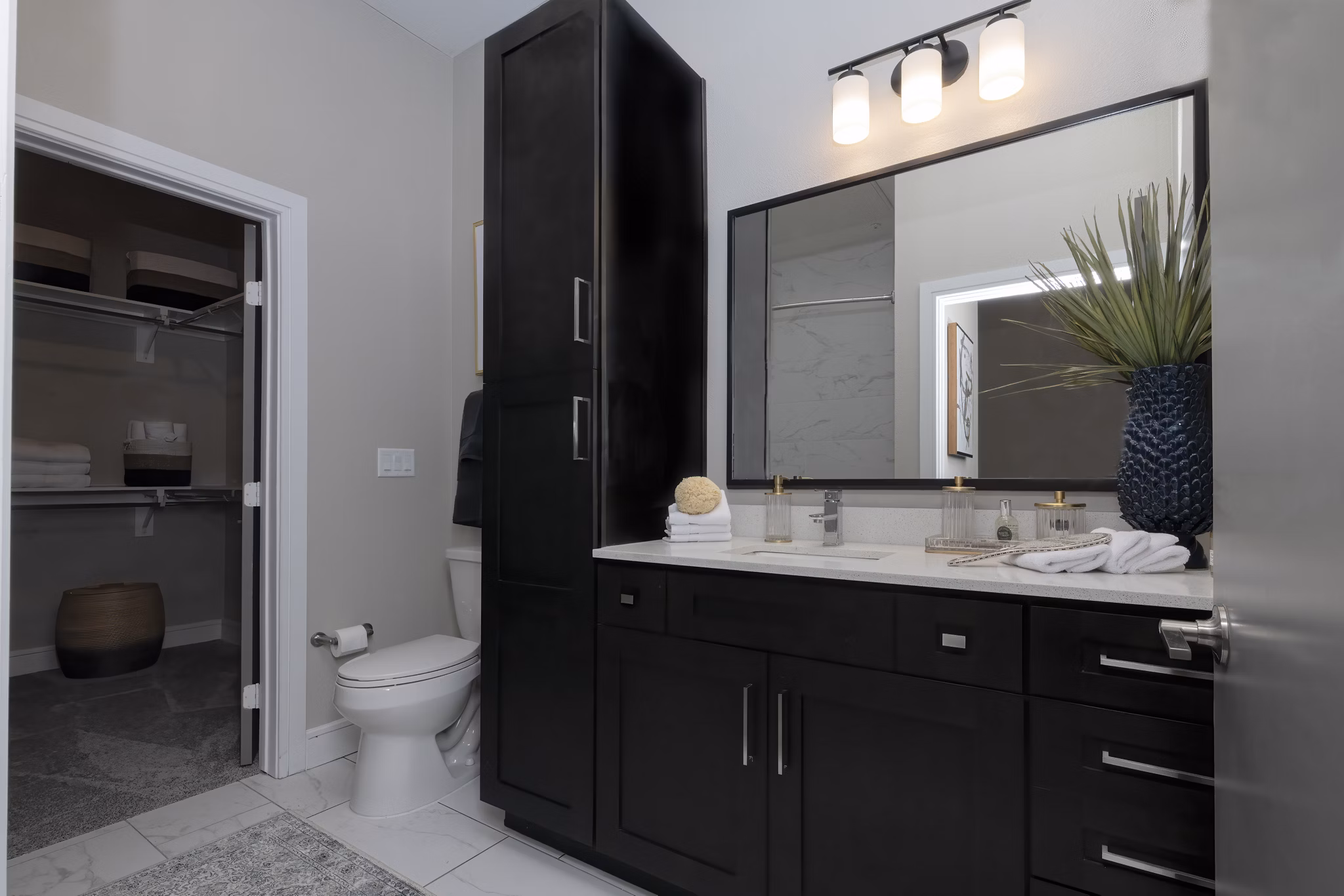 Modern bathroom with sleek fixtures at Canal 1535 Apartments, offering luxury living in a vibrant community