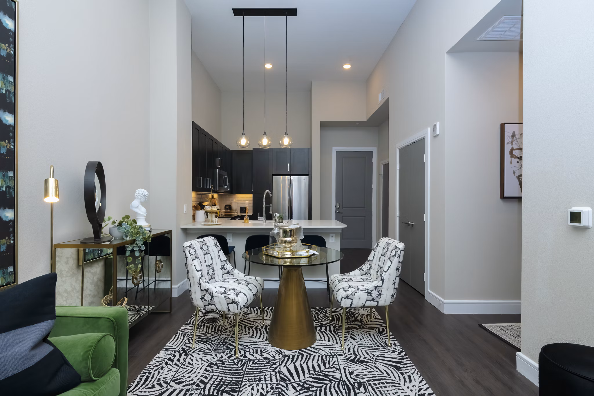 Dining area with modern furnishings and ample natural light at Canal 1535 Apartments, luxury living in New Orleans