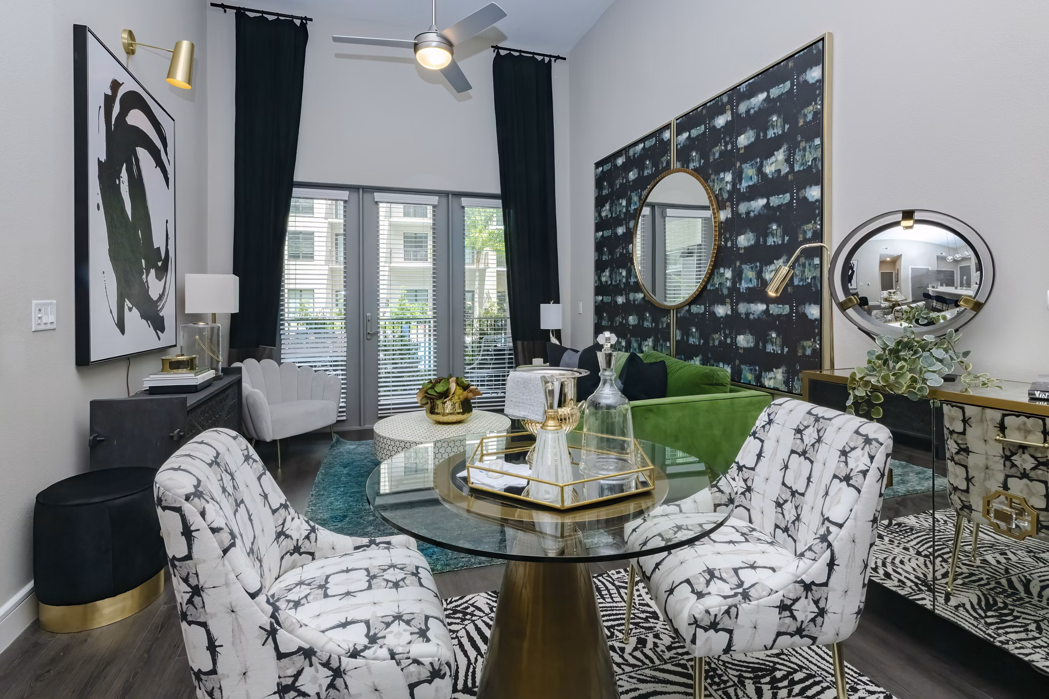 Dining area with sleek modern furnishings at Canal 1535 Apartments, showcasing luxury living in a sophisticated ambiance