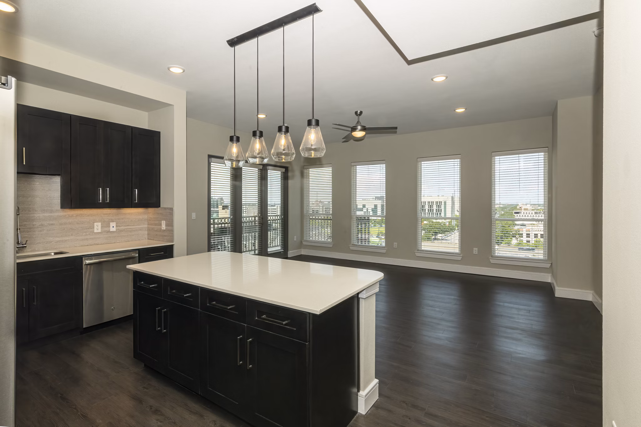 Modern kitchen featuring stainless steel appliances and sleek countertops at Canal 1535 Apartments