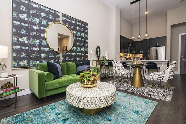Spacious living room with modern decor and ample natural light at Canal 1535 Apartments