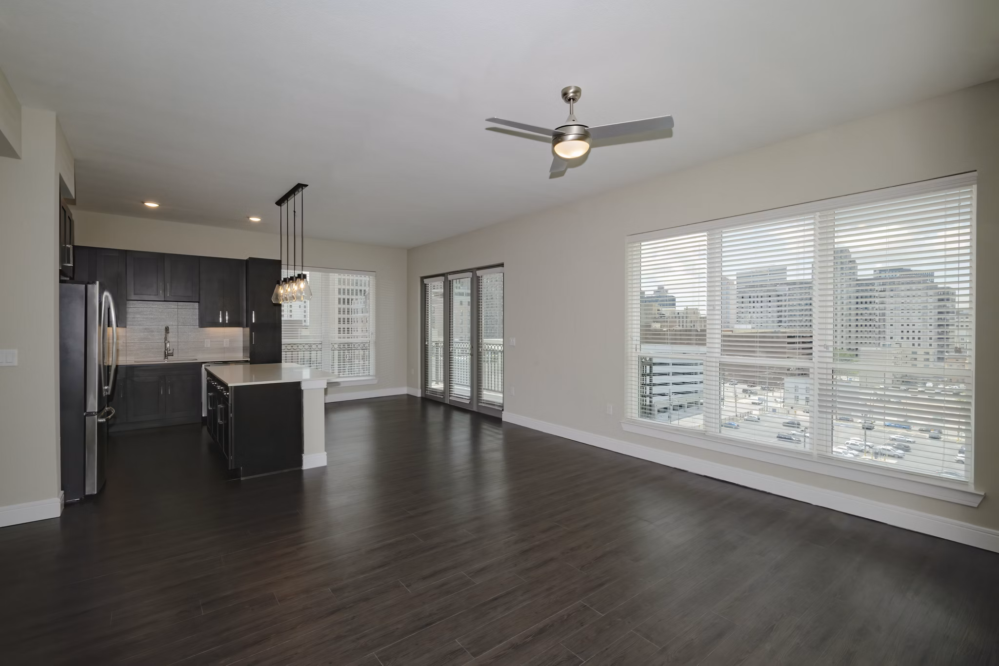 Elegant living room with modern furnishings at Canal 1535 Apartments, featuring cozy ambiance and stylish decor