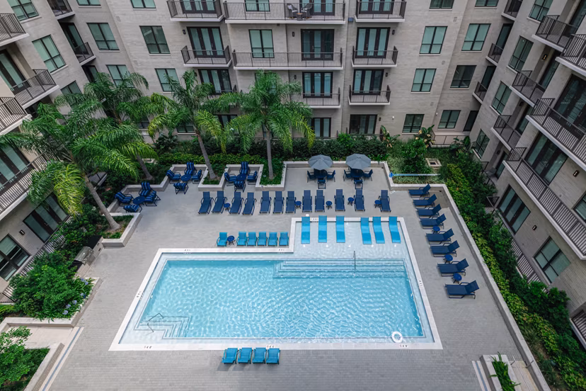 Relaxing rooftop pool with city views at Canal 1535 Apartments, offering luxury amenities in a prime urban location