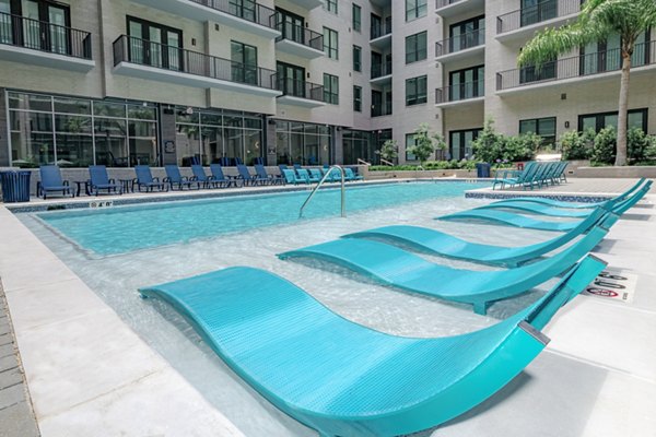 Rooftop pool with city skyline views at Canal 1535 Apartments