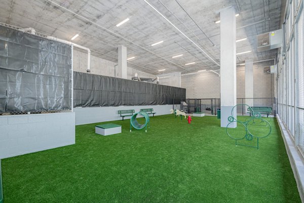 Dog park with modern amenities at Canal 1535 Apartments, perfect for pet owners in a vibrant community setting