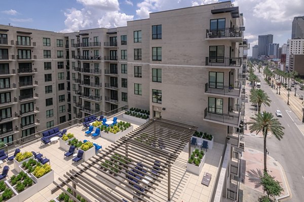 Modern courtyard with lush landscaping at Canal 1535 Apartments, luxury living in a vibrant neighborhood