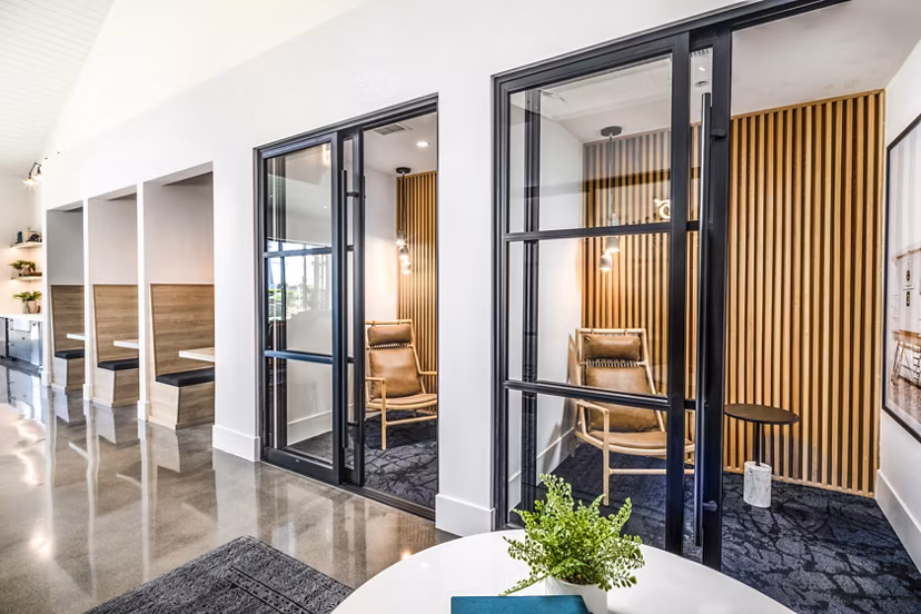 Silo Apartments: Inviting clubhouse with contemporary design and cozy seating areas in the heart of Fort Worth, Texas