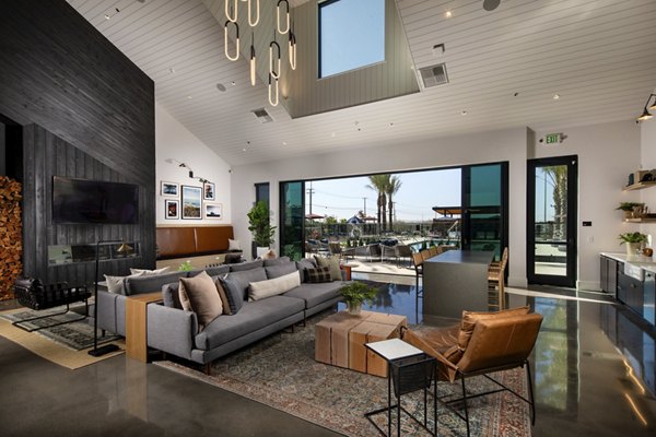 Clubhouse featuring modern design and cozy seating at Silo Apartments, luxury community managed by Greystar