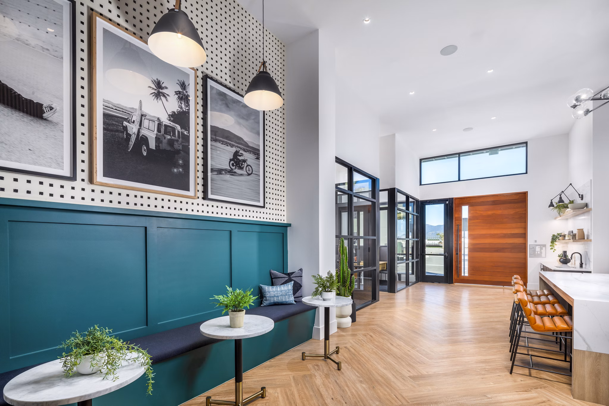 Clubhouse with modern decor and lounge seating at Silo Apartments, a Greystar luxury community