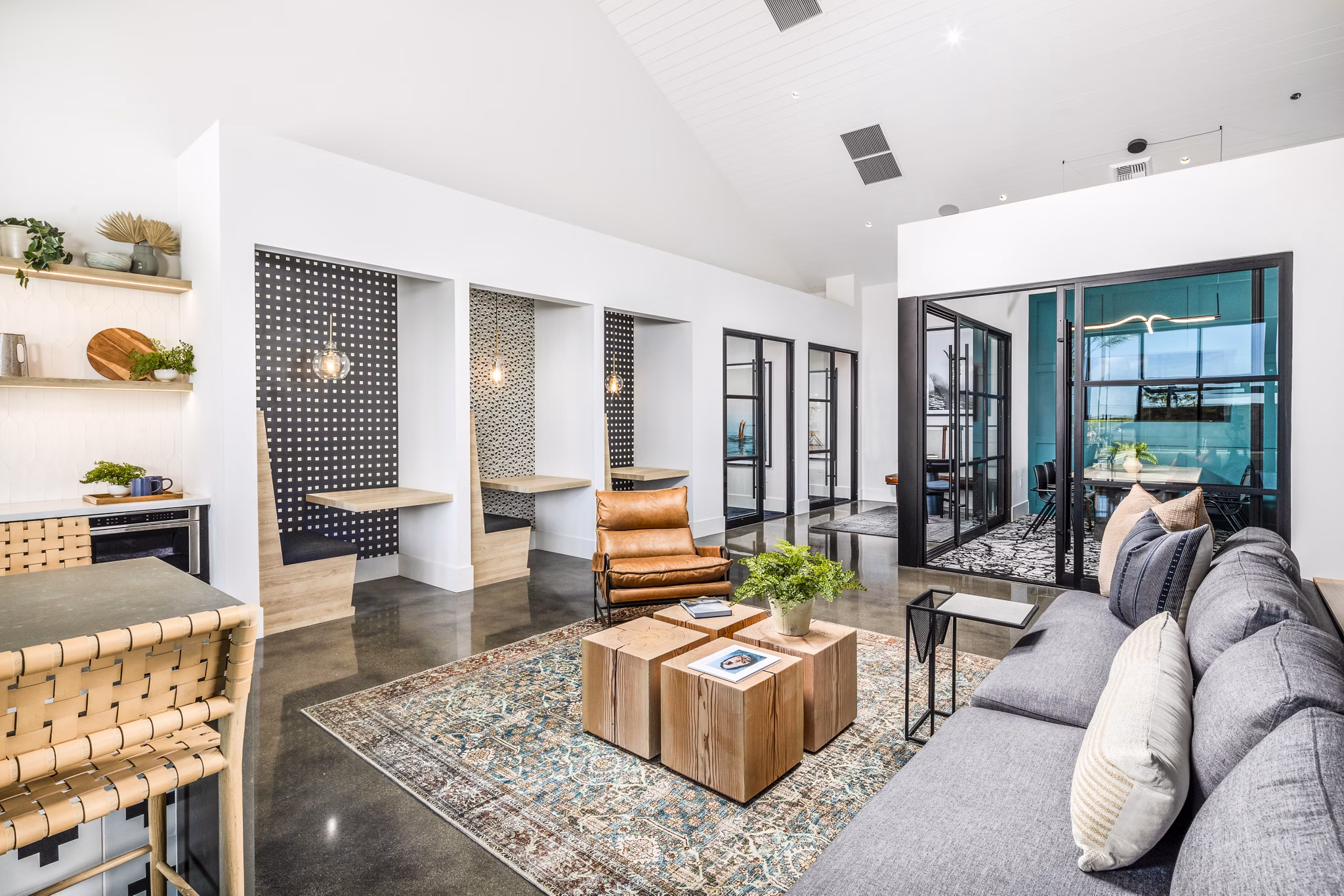 Modern clubhouse with sleek furniture and open layout at Silo Apartments, showcasing luxury living in a premier Greystar community