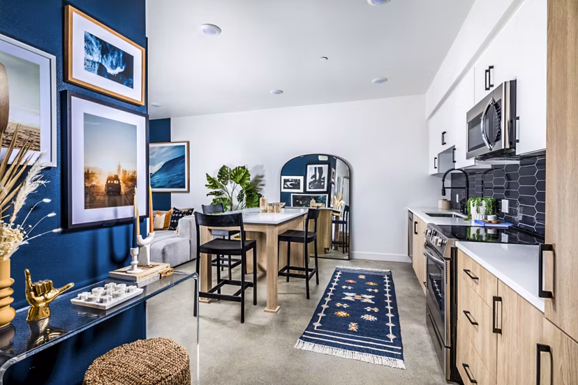 Dining room featuring modern furniture and pendant lighting in Silo Apartments