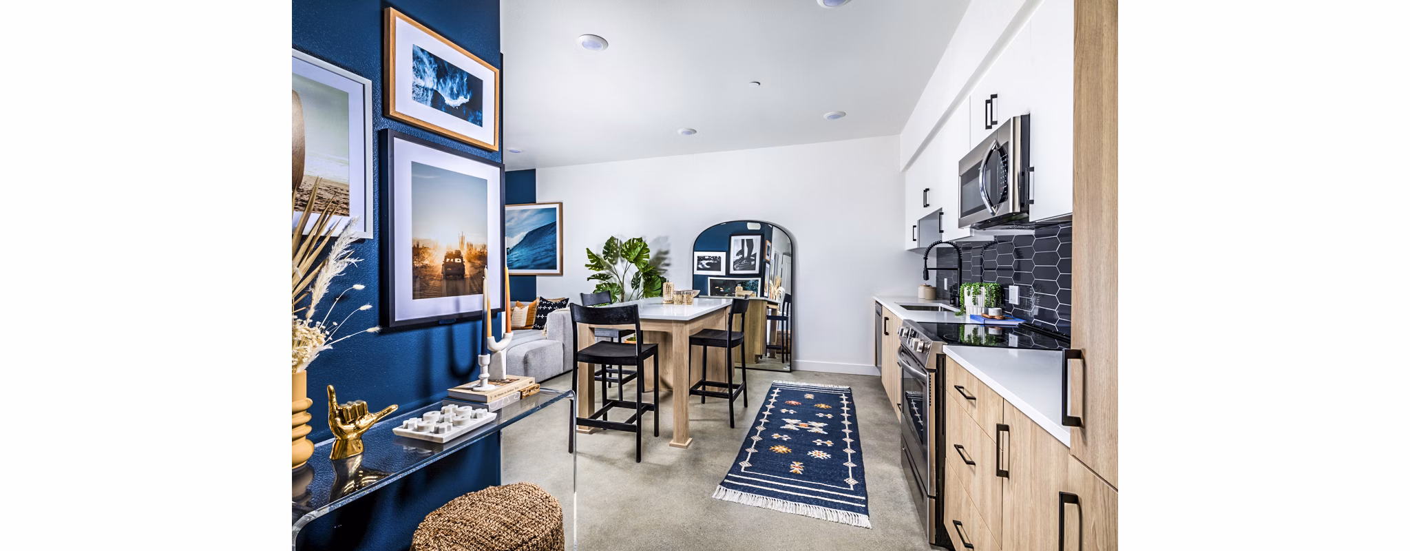 Dining room featuring modern furniture and pendant lighting in Silo Apartments